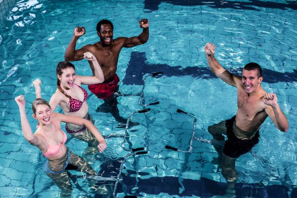 adults swimming at AquaChamps Swim School